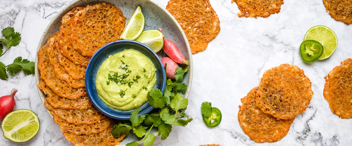 Cheese crisps with creamy avocado dip