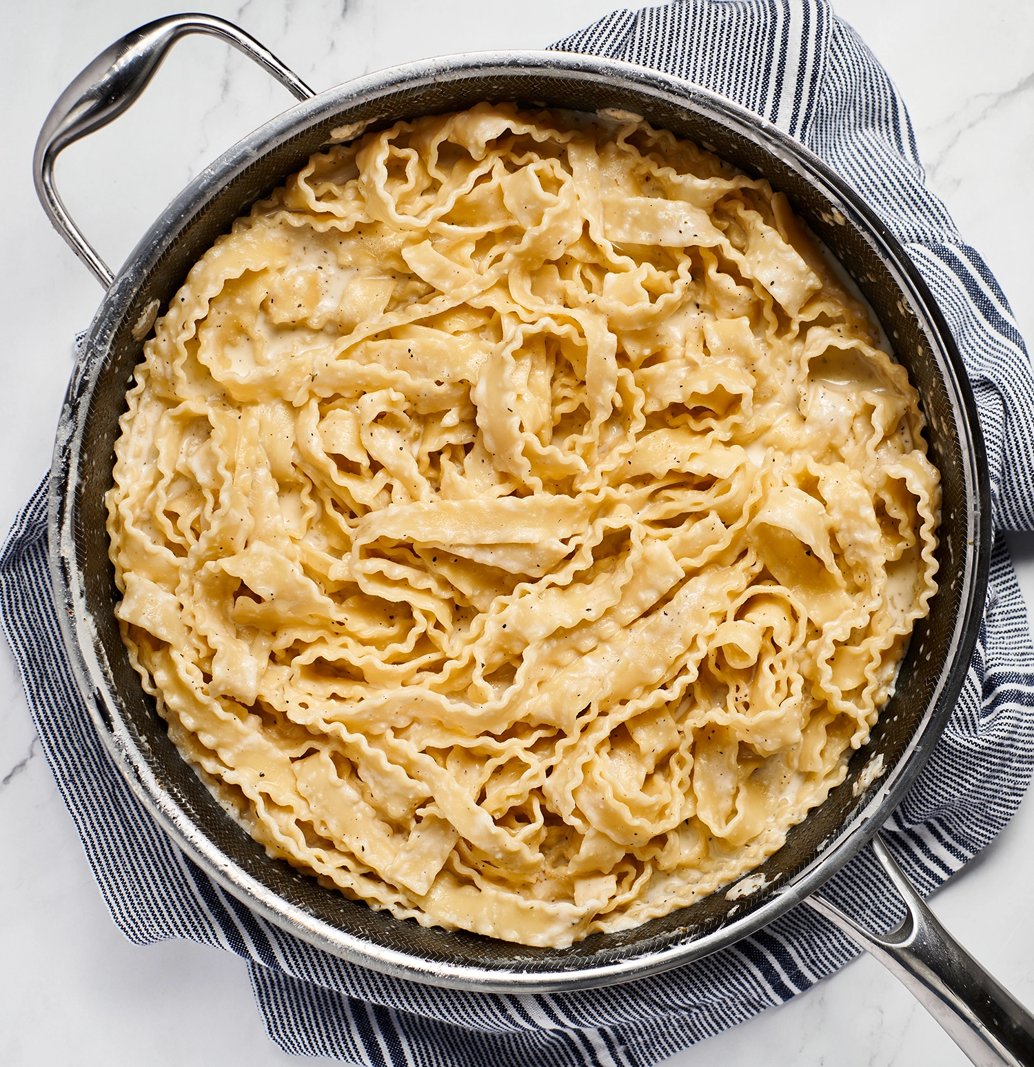 High-protein cottage cheese alfredo sauce tossed in pasta.