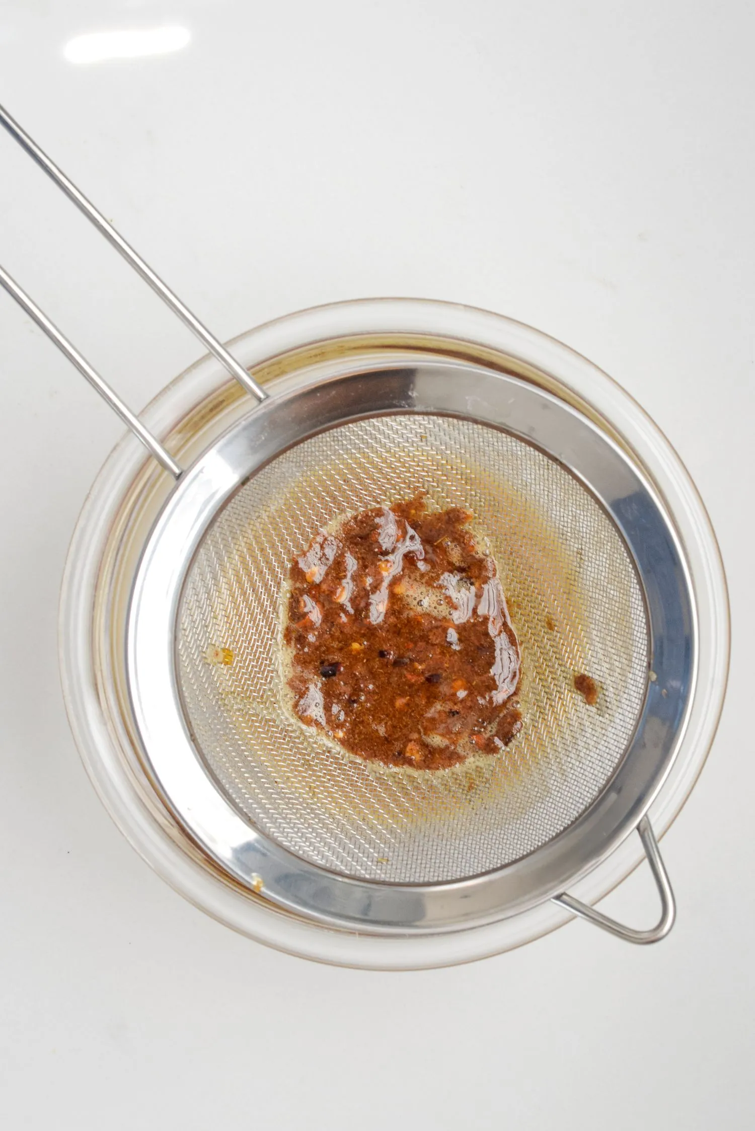 Strained mixture that creates hot honey.